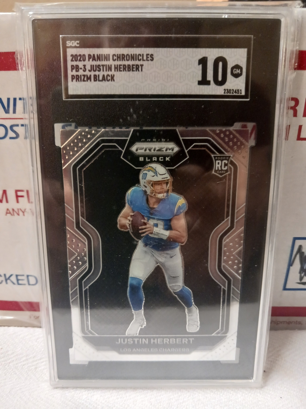 2020 Panini Chronicles Prizm Black Justin Herbert Rookie Card SGC GEM 10